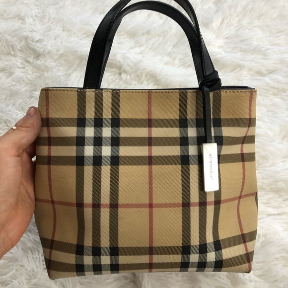 Burberry Handbags - Burned at hand bag/purse